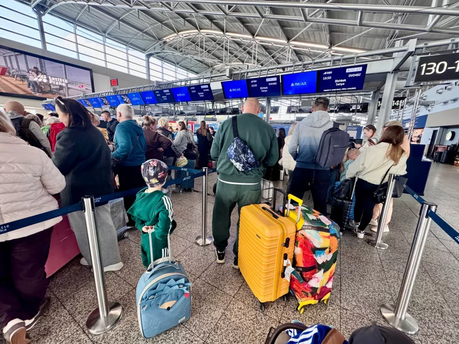 Bejelentkezés a PRG-SYX járatra a SCAT segítségével